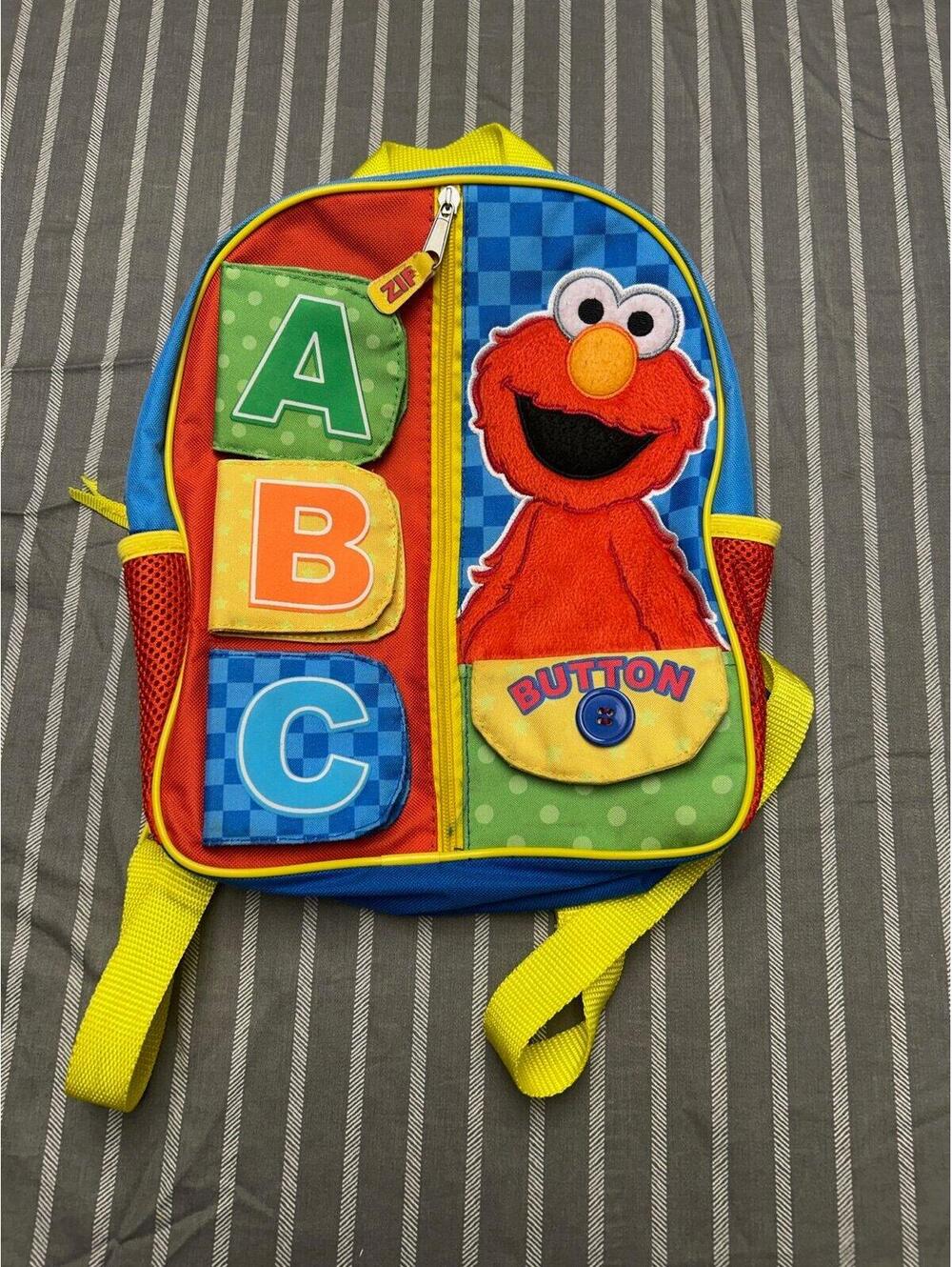 Sesame Street Elmo ABC Kids Small Backpack Polyester Zip, Button Accent